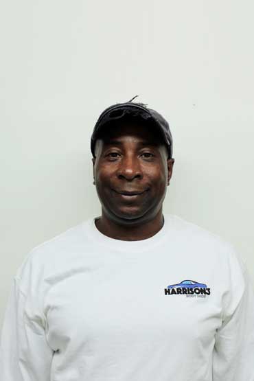 Johnny L man-smiling-at-camera